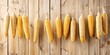 Abstract, minimalism, generated, yellow corn cobs hanging on a string and drying on a wooden background, household, produce, fruit