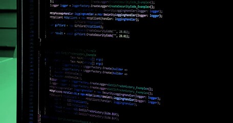 hacker scrolls program code on notebook computer, cyber security concept