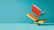 Books in colored covers flying on a blue background