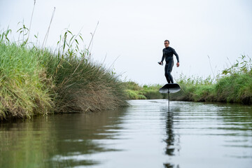 Hydrofoil rider gliding over the water