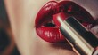 Tight close up of lipstick being applied to a beautiful set of female lips filling the frame, softly lit by daylight