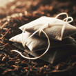 Tea bags lie on dry tea leaves, top view, close-up. International Tea Day.