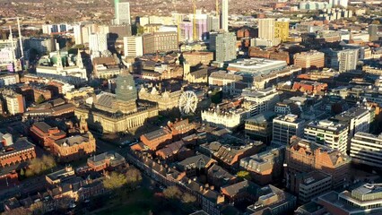 Wall Mural - Aerial footage of the Leeds Town Centre at Christmas time showing the Christmas Ferris wheel and lights near the Leeds Town Hall in the heart of the Leeds City Centre in West Yorkshire UK