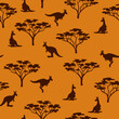 Seamless australian pattern with kangaroo and tree silhouettes. Vector illustration