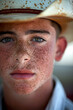 Young boy cowboy with green eyes