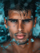 Handsome young man shower wet looks through glass at camera
