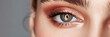 Beautiful macro shot of female brown eye make up with peach fuzz eyeshadows. Gorgeous Close-Up: Brown Eye Makeup