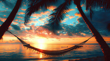 Silhouette Of A Hammock Between Palm Trees At Sunset On A Beach