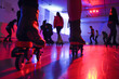 1970s roller disco: Colorful lights illuminate the rink as skaters groove to disco beats, embracing the funky fashion.