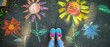 Child's Feet Over Colorful Sidewalk Chalk Art Flowers