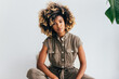 © VICTOR TORRES/Stocksy - Confident young black woman with curly afro hair posing