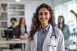 © Canvas Alchemy - Young white woman wearing doctor uniform and stethoscope with a happy smile. Lucky person