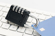 Security lock closed on credit card on computer keyboard . Financial data protection concept