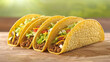 Four appetizing tacos with beef, cheese, and lettuce on a wooden surface