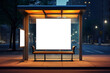 Glow of fluorescent lights illuminates empty bench. Bus stop decorated with blank citylight board stands on city street with bright streetlights.