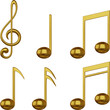 set of isolated gold music notes and violin key
