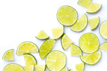 Wall Mural - Fresh lime slices on white background.