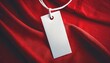 white clothing tag on red fabric background blank label mockup template design concept