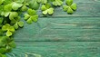 shamrocks on green wooden table a symbol og st patricks day bbanner with corner border of shamrocks textured pattern