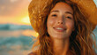 A portrait of a young woman in a straw hat on sunset.