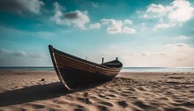 Small Wooden Boat On The Sand Under A Blue Sky