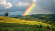 Rainbow Over Lush Green Hillside