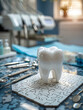 Pieces of a tooth puzzle on a dental hygienists tray with cleaning tools around