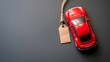 A toy car model with a price tag is displayed on a gray background, offering a top view and a conceptual representation of value