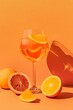 © eruppee - cocktail aperol spritz glass alcohol liquid reflection retro summer party poster orange background photo pop art flat lay style copy space