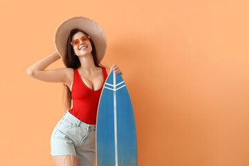 Sticker - Portrait of pretty young woman with surfboard on beige background