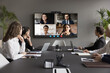 Four applicants on monitor screen, HR managers listen candidates at remote job interview, virtual meeting. Video call application usage for negotiations and business communication. Telemeeting event