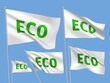 White vector flags with green ECO text. A set of wavy 3D flags with flagpoles isolated on light blue background, created using gradient meshes