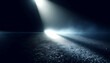 Spotlights on a wet asphalt floor, showing beams of light in darkness, with an atmospheric and mysterious concept. Generative AI