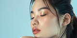 Fototapeta  - close up portrait of a beautiful Asian woman with glossy lips and closed eyes wearing light makeup and having clean, generative AI