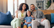© peopleimages.com - Portrait of mom, dad and child on couch with smile, love and bonding together in living room of home. Face of happy people with father, mother and daughter on sofa with relax and embrace in lounge
