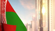 flag of Belarus on city skyscrapers buildings vanilla sunset background for national celebration - abstract 3D illustration