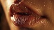 A thin film of saliva glistening on the surface of parted lips. .