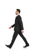 © Who is Danny - A man in a business suit walking isolated on a white background, ideal for clean design elements