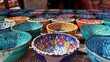 Closeup shot of ornamented plates for sale in Wadi Rum Desert market, Jordan