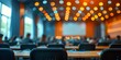 © kwanchaift - A defocused image capturing the atmosphere of a seminar room with people attending lectures and educational sessions