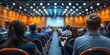 Defocused image of a crowded conference room with people attending meetings and seminars in a corporate setting