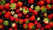 Background of fresh sweet red raspberries and strawberries arranged together representing concept of healthy diet. Berries and strawberries are arranged together.