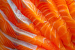 © kossovskiy - Intricate pattern of fresh salmon slices close-up