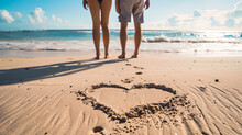 A Heart Shape In The Sand Made Out Of Footprints With A Couple Walking 