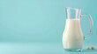 glass of milk, a jug of milk on blue background ,Fresh Milk in Pitcher on blue background with copy space