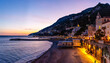 View of the mountains, coast and beaches of Amalfi in the evening at sunset