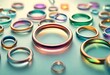 abstract background with circular glass rings isolated on soft colored background, decorative rings, slippery rings, glass rings, multi color rings