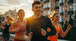 A smiling group of friends running outdoors in front of a city background, wearing athletic wear and black shoes in the golden hour lighting