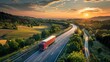 Two trucks overtake each other on a serene rural road under a stunning sunset sky