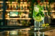 A Mojito Cocktail in a Wine Glass, Bursting With the Zest of Lime Slices and the Freshness of Mint Leaves, Set on a Bar Counter